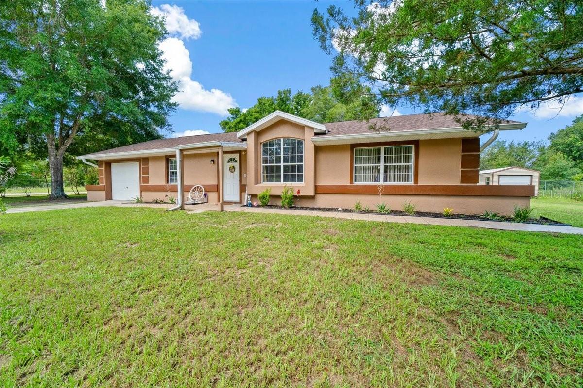 Welcome to your perfect retreat in Rolling Ranch Estates! This beautifully maintained 2-bedroom, 2-bathroom home sits on a spacious .43-acre fully fenced corner lot, offering privacy, space, and plenty of room to enjoy the outdoors.
Step inside and enjoy the peace of mind that comes with major upgrades already done for you — including a brand-new roof, new HVAC system, new water heater, and a water softener system. The home also features a screened-in back room, ideal for relaxing evenings, entertaining guests, or enjoying your morning coffee while taking in the serene surroundings.
Located just minutes from the crystal-clear waters of Rainbow River and a short drive to the renowned World Equestrian Center, this home offers the best of both nature and lifestyle convenience.
Whether you're looking for a full-time residence, seasonal escape, or investment opportunity, this home checks all the boxes.
Don't miss your chance to own a move-in ready home in a peaceful and desirable location!