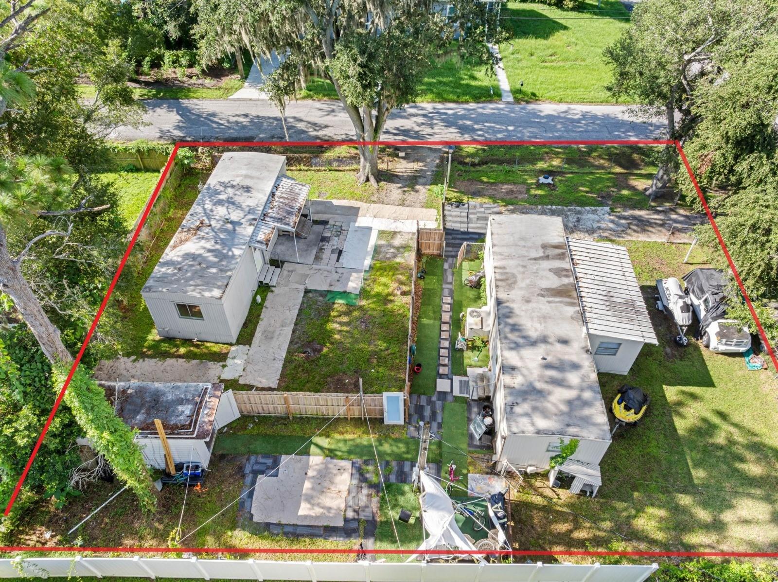 !!Location, Location, Location! - TWO Manufactured Homes on the same lot with separate utility and power poles
AMAZING OPPORTUNITY FOR EXTRA INCOME AND LIVING IN THE SAME PLACE
No HOA or CDD. Discover two well-maintained manufactured homes, the first (2 bedrooms, living room, eat-in kitchen, and 1 bathroom) offering 700 square feet of comfortable living space.
The second fully detached mobile home with 1 bathroom and a separate living room and dining room (offering 500 square feet of comfortable living space). LOUNDY OUTSIDE OF PROPERTY FOR BOTH HOMES Situated on a clean and spacious double corner lot, this property offers ample room for RVs, boats, workshops, and more. Enjoy the convenience of a prime Carrollwood location, located near grocery stores, shopping centers, and Veterans Expressway. Just 10 minutes from the airport, this home ensures easy access to all your essential destinations. Don't miss this fantastic opportunity to own a home in one of Carrollwood's developing and desirable areas.