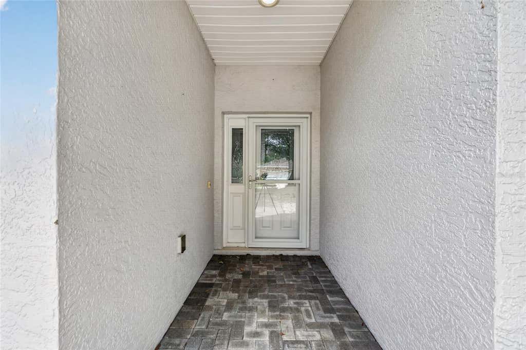 Photo of 7933 SW 83rd Place, Ocala, FL 34481 (MLS # OM728545)