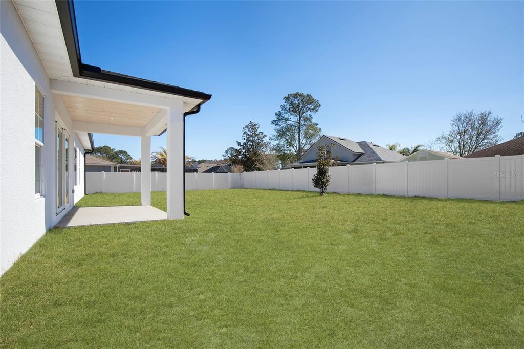 Photo of 70 Bennett Lane, Palm Coast, FL 32137 (MLS # FC316425)