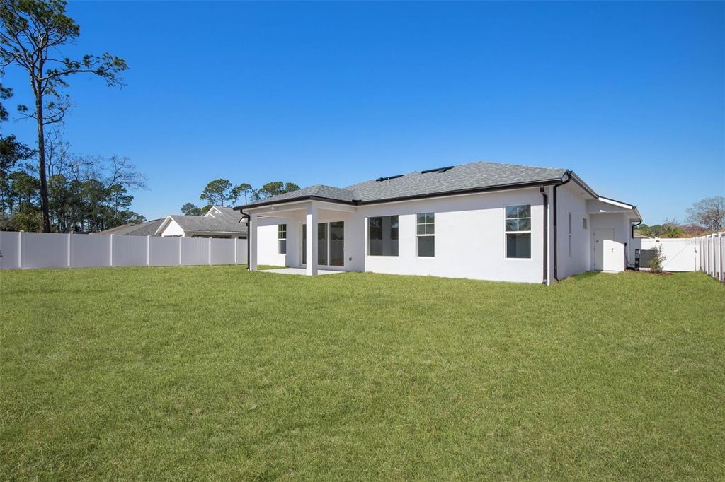 Photo of 70 Bennett Lane, Palm Coast, FL 32137 (MLS # FC316425)