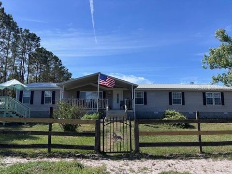 Photo of 10250 NW 67th Place, Chiefland, FL 32626 (MLS # GC539813)