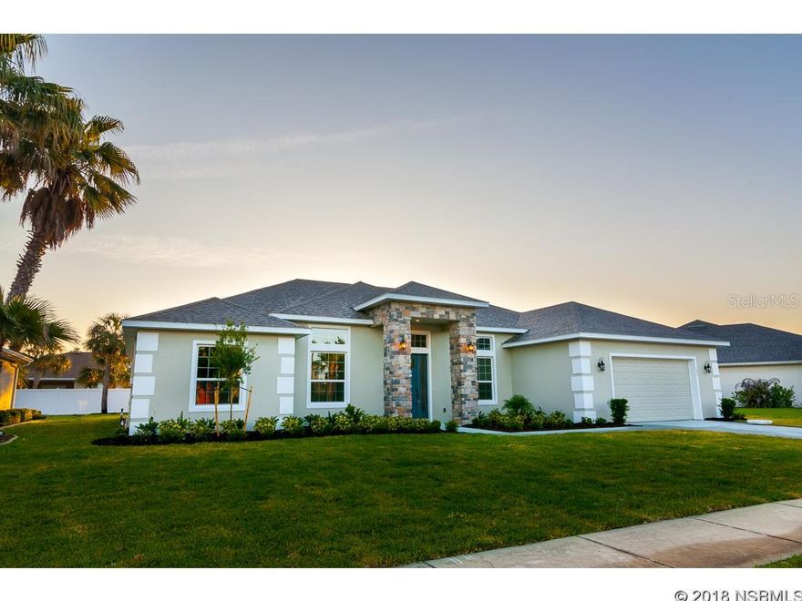 PRICED BELOW APPRAISAL! **LIMITED TIME INCENTIVE** Builder will contribute $5,000 towards buyers' closing costs for a full-priced offer to close on or before 8/31/18! New construction in the heart of New Smyrna Beach! One of the last lots in Mangrove and Inlet Shores and this one could be yours! This gated community is less than 10 minutes from the beaches and offers a private community launch...perfect for kayaking/canoeing or for taking in all that surrounds you! Completely custom home offers 4 bedrooms and an office, 3 bathrooms- a three-way split!This energy efficient home has Icynene roof insulation as well as Energy Star dual glazed low e windows. 16 seer Trane A/C. Large kitchen peninsula with oversized undermount sink. Quartz countertops with glass tile backsplash. All Kitchenaid appliances. Beautiful Moen fixtures throughout home. 8' interior doors. 12' ceilings in the main living area. Oversized garage with 16x8 garage doors Call to schedule your private viewing today! ;Water: City