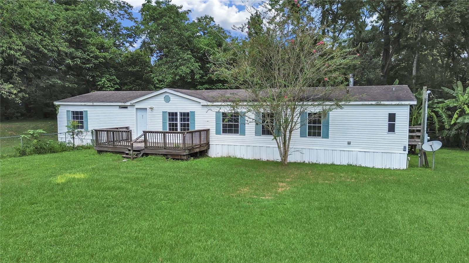 Welcome to a charming Brooksville retreat that perfectly blends timeless character with modern comfort. Nestled on a spacious 1/2 acre lot in a desirable location, this home offers the lifestyle you’ve been searching for—peaceful, inviting, and move-in ready.
Step inside this move-in ready 4 bed/3 bath home and you’ll be greeted by an abundance of natural light that highlights the home’s warm and welcoming atmosphere. It has a warm, inviting interior featuring central air, electric fireplace, and a thoughtfully designed layout perfect for both entertaining and everyday living. The floor plan features a comfortable living area, a beautifully updated kitchen, and generously sized bedrooms that provide both privacy and convenience. One of the standout features is the bonus room off the master bedroom—a versatile space that can be transformed into a private office, a quiet nursery, a personal gym, or a creative studio. With fresh updates throughout, you can enjoy the charm of a classic Florida home without the worry of constant upkeep.
The outdoor space is just as impressive. The large backyard is ideal for family gatherings, gardening, or simply relaxing under the Florida sunshine. Whether you envision hosting weekend barbecues or creating your own private oasis, the possibilities are endless.
Located just minutes from historic downtown Brooksville, you’ll enjoy easy access to local shops, dining, parks, and community events. Plus, with quick access to major roadways, commuting to Tampa, Orlando, or the Gulf Coast beaches is a breeze.
Whether you’re a first-time buyer, downsizing, or looking for a solid investment, this is the perfect place to call home. Plus, no HOA! Don’t miss your chance to own a piece of Brooksville charm—schedule your private showing today!