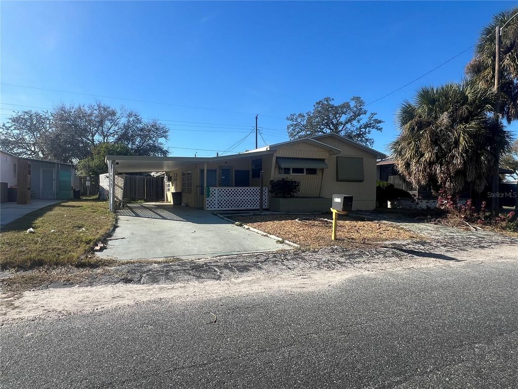 Photo of 2103 Pleasure Drive, Holiday, FL 34691 (MLS # TB8470567)