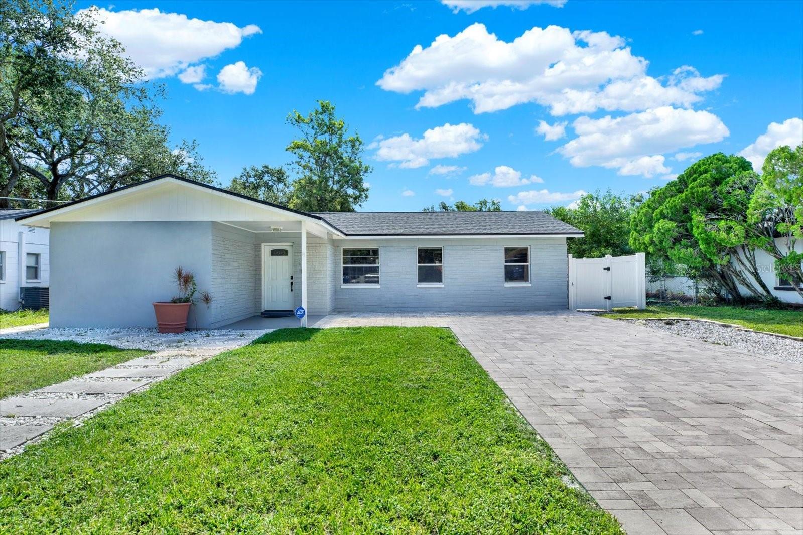 Welcome to this beautifully updated 4-bedroom, 2-bathroom single-family home blends comfort, convenience, and contemporary upgrades—all in one unbeatable location. Just minutes from Downtown Tampa, MacDill Air Force Base, the beaches, and top shopping spots, you'll love how connected you are to everything.
Step inside to discover a harmonious blend of modern upgrades and timeless design. Recent renovations include brand-new windows, luxury vinyl plank flooring, a contemporary backsplash, and elegantly remodeled bathrooms. The stylish kitchen features sleek, modern cabinetry and ample space for cooking and entertaining. A smart thermostat adds comfort and energy efficiency, rounding out the thoughtful updates throughout the home.
Outside, you’ll love the spacious brick-paved backyard—perfect for entertaining, relaxing, or enjoying Florida’s sunshine year-round. The oversized brick driveway easily fits up to six cars, offering rare and valuable parking space in the city.
Best of all? No HOA restrictions and no flood insurance required, providing both freedom and peace of mind.
Whether you’re relaxing in the spacious living area, enjoying a quiet evening in your private backyard, or exploring everything South Tampa has, this move-in-ready home delivers lifestyle and location in one perfect package.