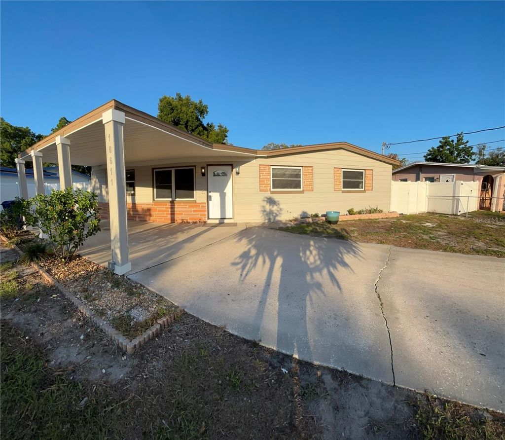 Photo of 10611 N Altman Street, Tampa, FL 33612 (MLS # TB8510033)