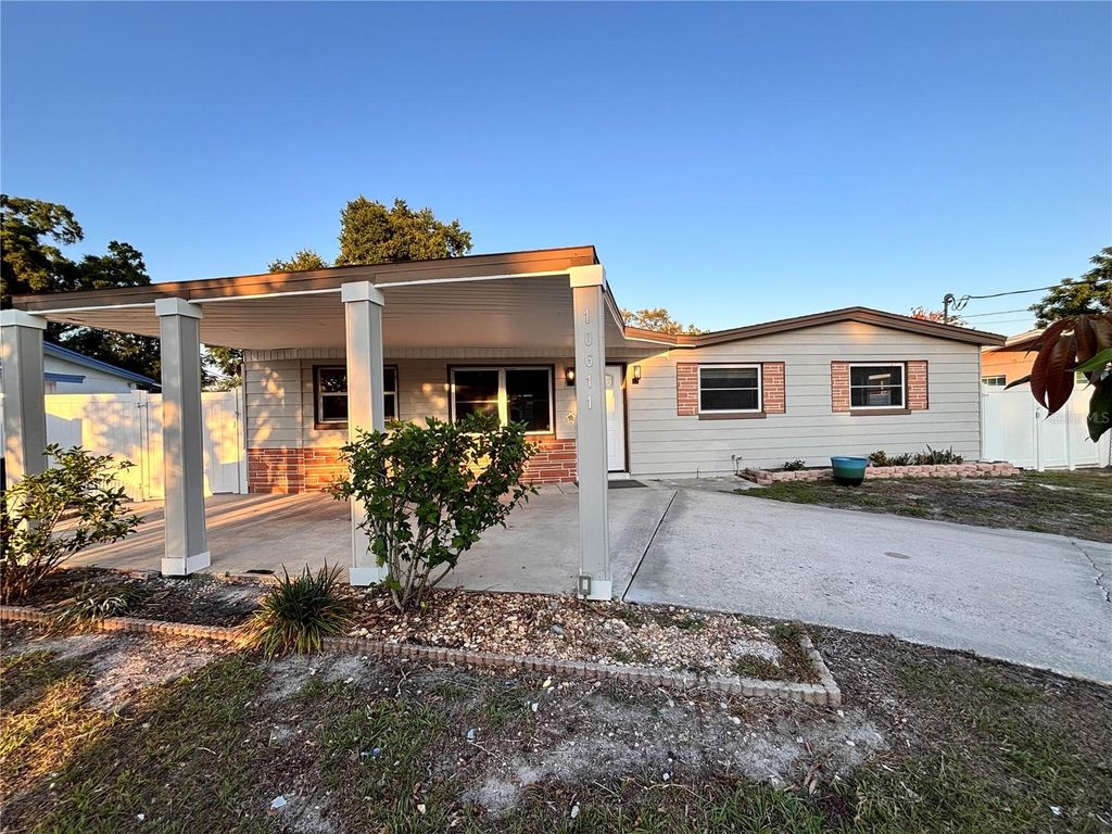 Photo of 10611 N Altman Street, Tampa, FL 33612 (MLS # TB8510033)