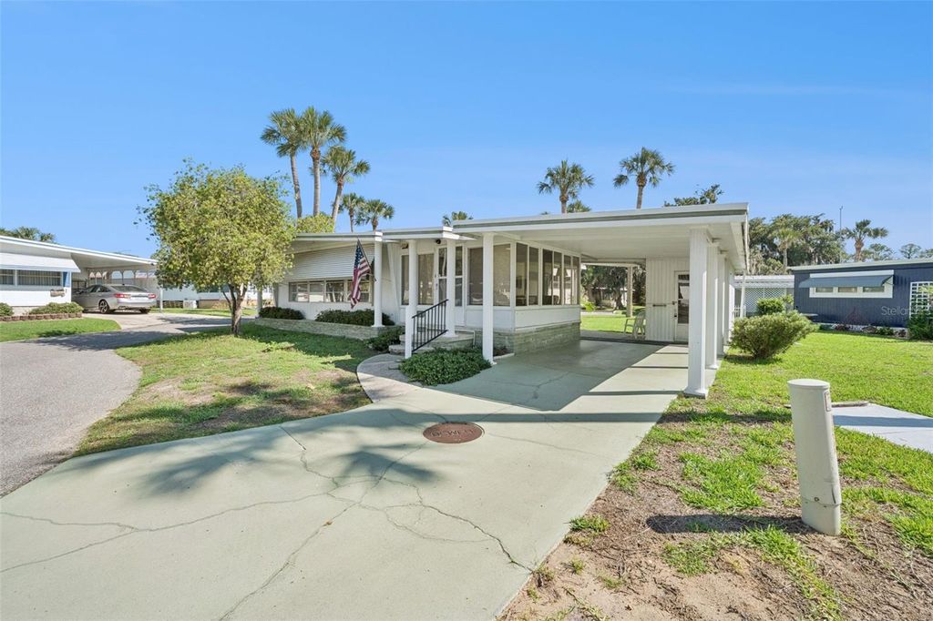 Photo of 43 Sabal Palm Circle, Eustis, FL 32726 (MLS # O6408775)