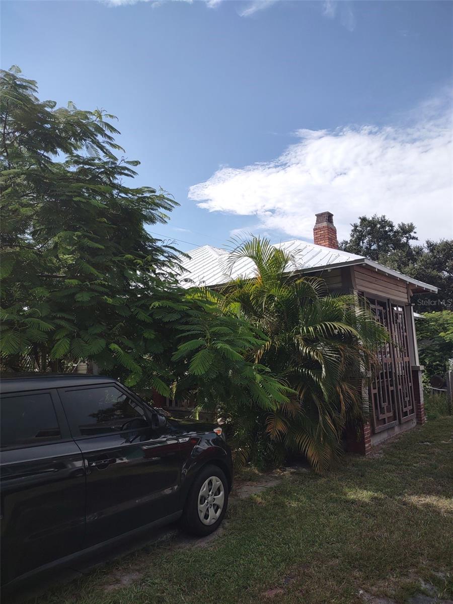***ATTENTION INVESTORS*** FIXER UPPER*** Welcome to this charming 1920s Clearwater bungalow offering endless potential in a prime location. This 2-bedroom, 1-bath home features 10-foot ceilings, a cozy fireplace, and a classic wrap-around porch. Inside, it’s bright, airy, and full of vintage charm. Zoned residential with permitted office use and future designation for residential/office/general, this property is perfect for a home, office, or business. Parking is also available in both the front and back of the property. Since 2022, major structural updates have been completed including a new metal roof, $60K in foundation repairs (jacks, piers, steel/wood beams, footings), new HVAC system and ductwork, and an upgraded electrical meter. Interior renovations, siding, and window replacements are still needed. Not located in a flood zone or evacuation zone, this home offers peace of mind and enormous potential. The location is unbeatable—just minutes to Clearwater Beach and the downtown district. Enjoy proximity to Coachman Park, The Sound amphitheater, Ruth Eckerd Hall, public golf and boat ramps, Pinellas Trail, the marina, top-rated restaurants, shopping, and more. Tampa International Airport is just a 40-minute drive away. Schedule your private showing today before it's gone!