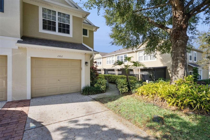 Welcome to this beautifully upgraded corner townhome located in the desirable gated community of  VISTAS AT LAKE HOWELL in Winter Park, Seminole County.

This spacious residence offers 1,682 sq ft under air (2,861 sq ft total), built in 2004, with 3 bedrooms and 2.5 baths, and is perfectly positioned on a corner lot for added privacy and natural light.

From the moment you enter, you’ll notice the thoughtful upgrades and clean, modern aesthetic throughout the home. The first floor features durable and elegant luxury vinyl flooring, soft neutral tones, crown molding, and an open-concept layout that flows beautifully for everyday living and entertaining.

The open kitchen is equipped with stainless steel appliances, generous cabinetry, and a convenient coffee or wine station. Three large sliding glass doors bring in abundant natural light and open to a covered and screened patio, creating a seamless indoor-outdoor living experience. The sliding door shades on the first floor are motorized for convenience and comfort.

The staircase is a true design feature, showcasing custom glass panels with modern style railings and integrated wall lighting that elegantly guides you to the second level.

Upstairs, you’ll find all three bedrooms, including a spacious primary suite with a large glass shower and granite countertops. The additional bedrooms are generously sized and ideal for family, guests, or a home office. All windows feature custom trim.

The  community offers 24-hour gated privacy, beautifully maintained surroundings, and is located within top-rated Seminole County schools, all with a remarkably low HOA fee. 2019 Roof.

Ideally located in one of Central Florida’s most sought-after areas, this townhome combines design, comfort, privacy, and location , making it a truly exceptional opportunity.

Schedule your private showing today.