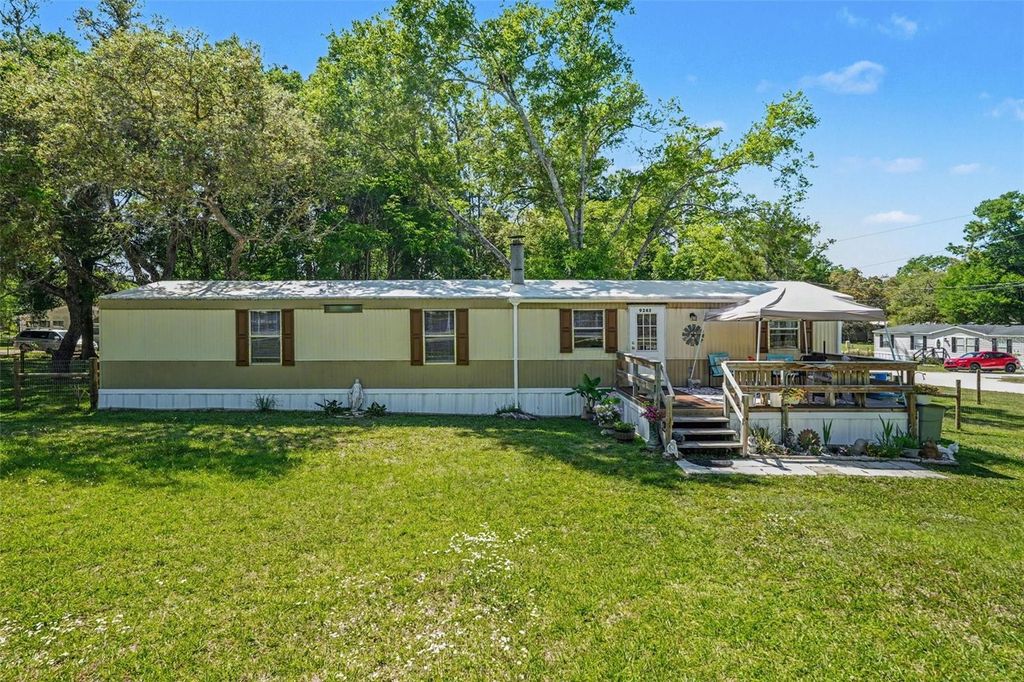 Photo of 9243 Cooper Terrace, Brooksville, FL 34601 (MLS # O6400026)