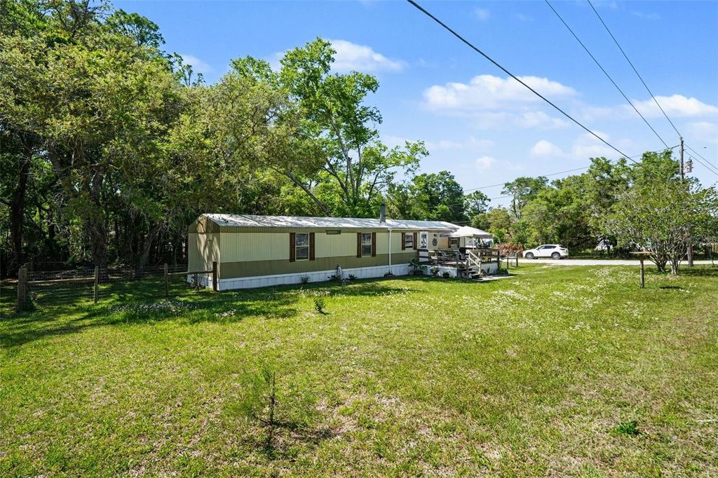 Photo of 9243 Cooper Terrace, Brooksville, FL 34601 (MLS # O6400026)