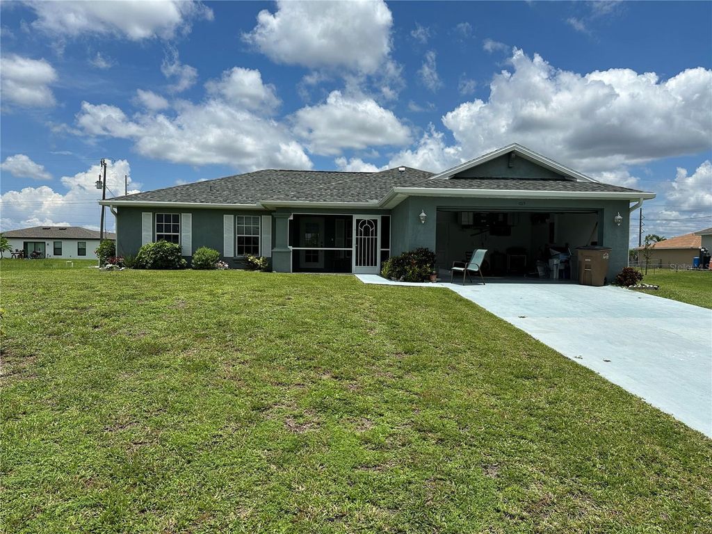 Photo of 1015 NW 23rd Street, Cape Coral, FL 33993 (MLS # V4943863)