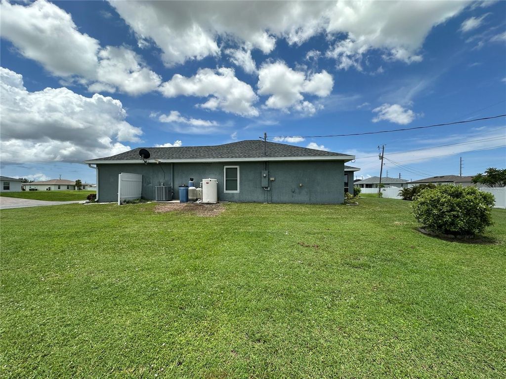 Photo of 1015 NW 23rd Street, Cape Coral, FL 33993 (MLS # V4943863)