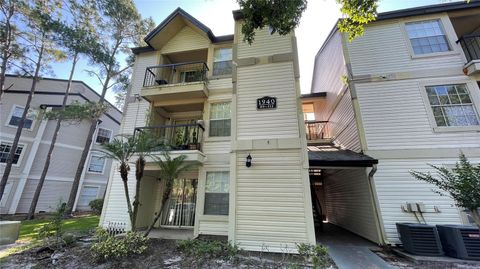 Photo of 1940 Lake Atriums Circle #108, Orlando, FL 32839 (MLS # O6360354)