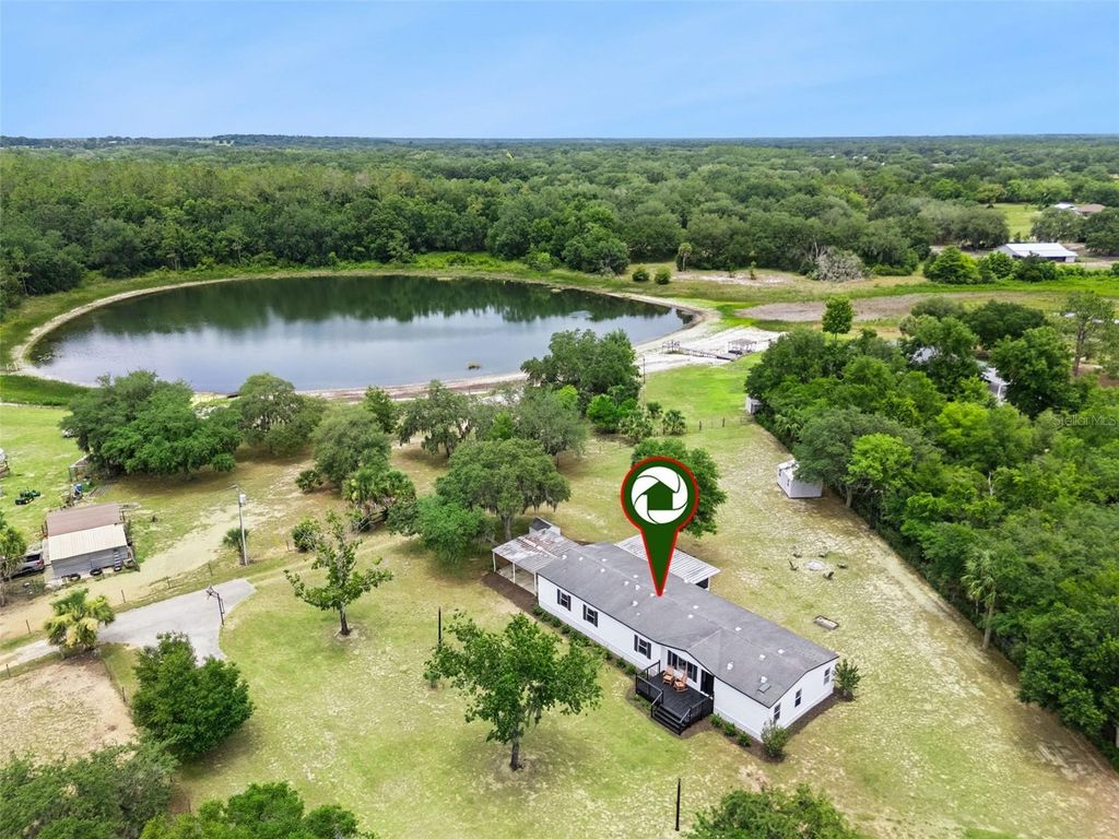 Photo of 11435 S Em En El Grove Road, Leesburg, FL 34788 (MLS # OM726515)