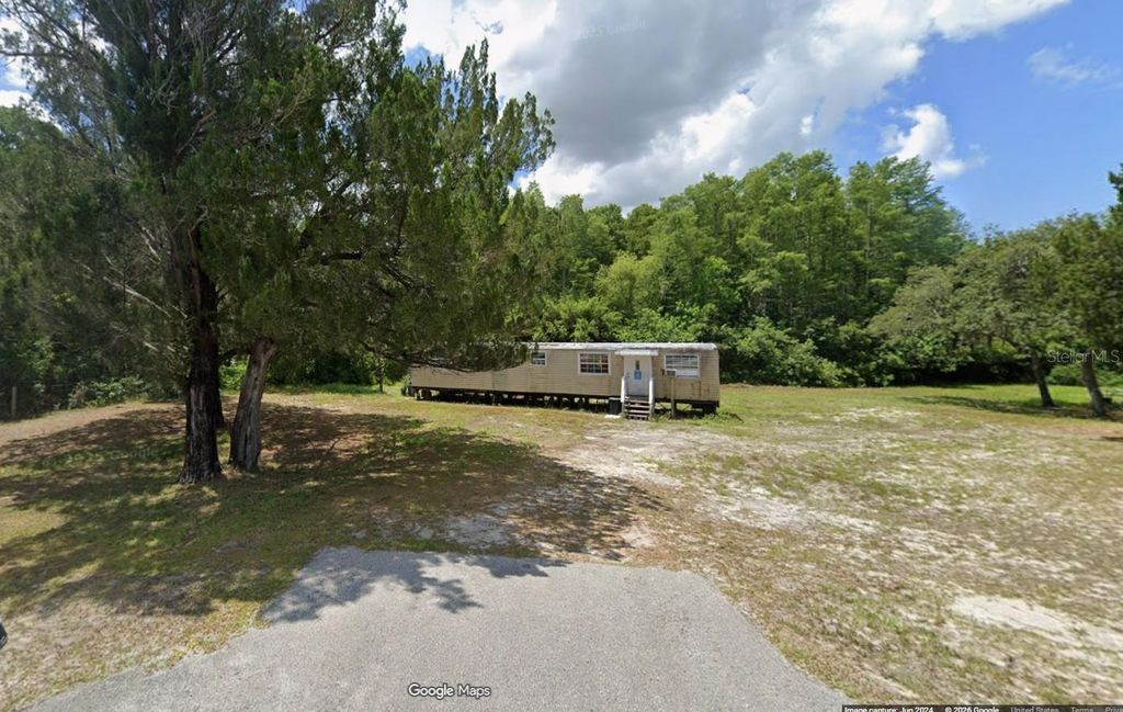 Photo of 10136 Saranac Trail, Hudson, FL 34667 (MLS # W7883335)