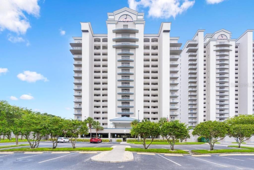 Photo of 13427 Blue Heron Beach Drive #706, Orlando, FL 32821 (MLS # O6449782)
