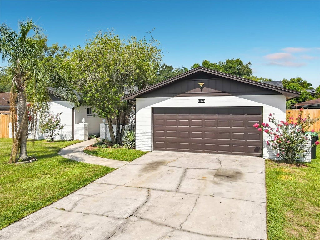 Photo of 8676 Hillside Drive, Orlando, FL 32810 (MLS # O6442018)