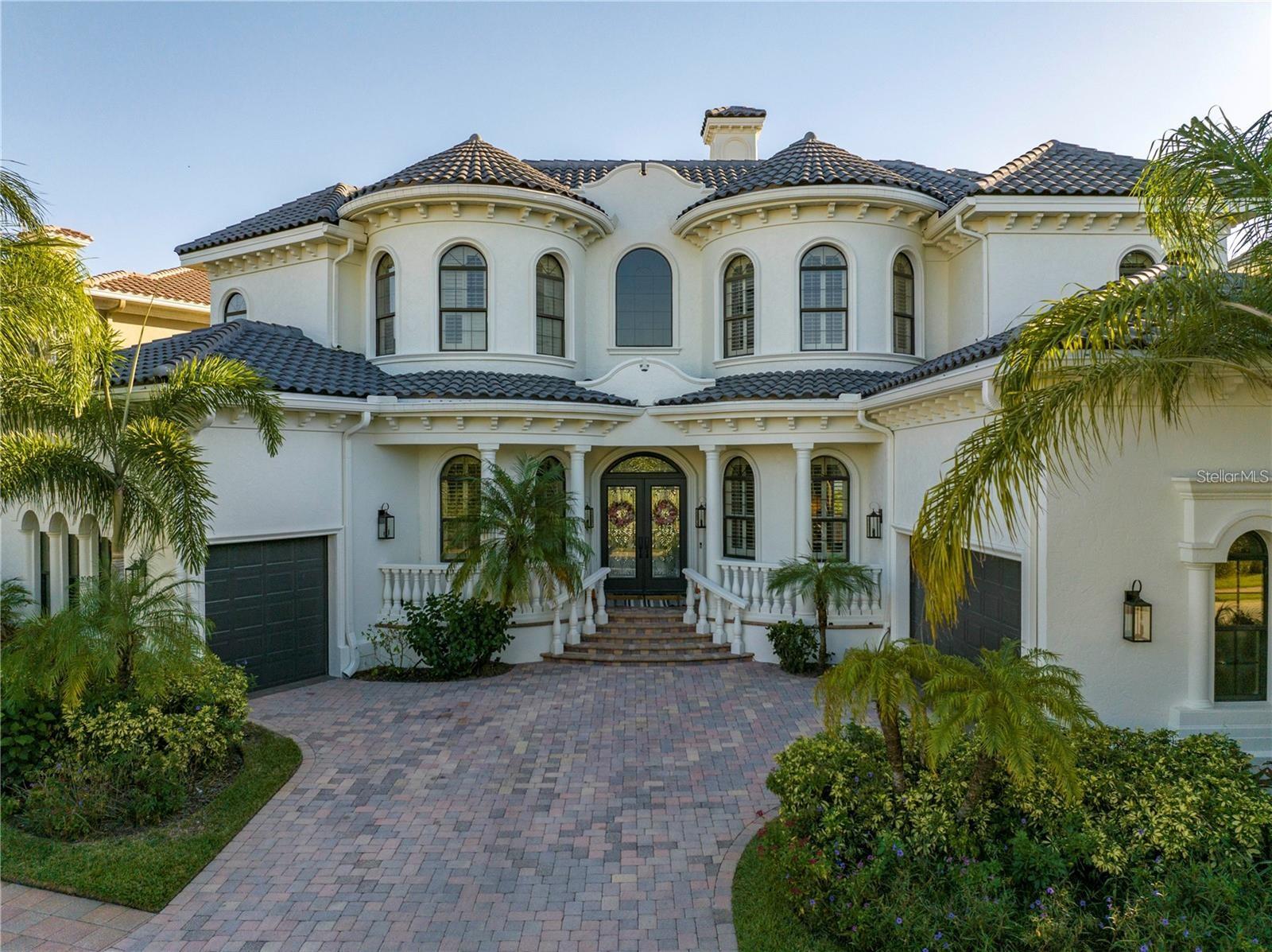 Welcome to Tampa Bay’s most desired gated waterfront community. The Reserve of Old Tampa Bay boasts some of West Florida’s most picturesque sunrises and sunset views. This fully furnished custom home offers a Mugala white marble pool and spa all run remotely from the Pentair App- it’s a true resort-like outdoor environment. Enjoy dinner Al fresco with a built in grille as well as smoker and take a seat at the granite seating area with a built in fire feature. The indoor features include a kitchen with thermador and subzero appliances, a large walk-in pantry, a butler pantry and laundry room off the kitchen. There are travertine floors throughout the first floor with 12ft ceilings and a full-service elevator. Spectacular architectural details with rich wood cabinetry, granite countertops, sweeping staircase with wrought-iron handrails, gleaming wood and stone tile floors, extensive crown molding, rubbed oil bronze handles/hardware/fixtures. Each bedroom elegantly offers their own on-suite plus two different office spaces/ bonus rooms.The Reserve of Old Tampa Bay is just minutes away from downtown Tampa, the beaches, and Tampa International Airport.