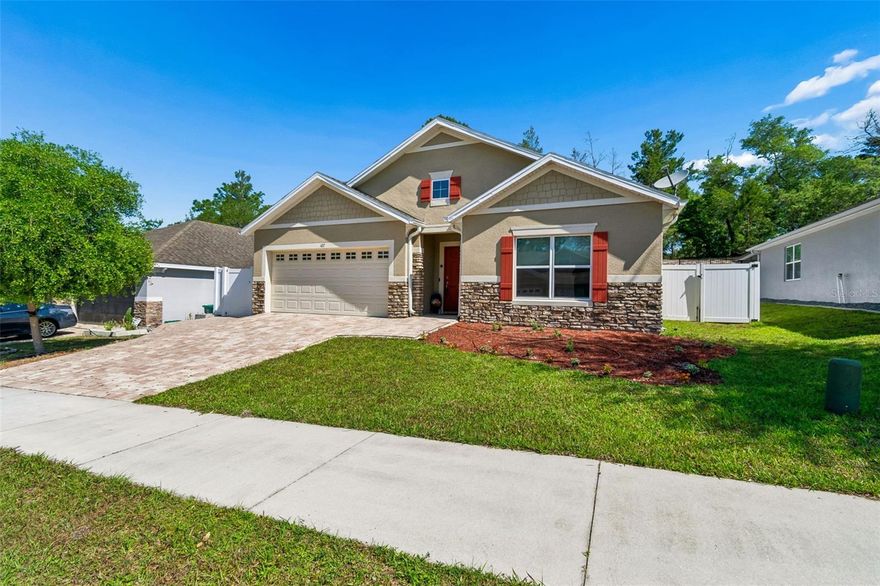 Welcome to this beautiful Florida Contemporary home located in the Country Club Village in Deland. This home has been meticulously maintained and shows pride of ownership. This home features 4 Bedrooms - 2 Baths with a 3-way split plan configuration, perfect for today’s lifestyle. The spacious entry flows into the center of the home featuring a beautiful Kitchen with an expansive island, overlooking the dining and living areas, Stainless Steel Appliances, Quartz Solid Surface Counter Tops and an Oversized Pantry.  This home features two bedrooms and a full bath in the front of the home, an additional bedroom in the center of the home, perfect for an office or a den and the primary suite located in the rear of the home overlooking the beautiful paver patio. The Primary suite features a double vanity, tile walk-in shower, an expansive walk-in closet and oversized linen closet. This home also features a spacious Covered and Screened Patio, overlooking a professionally installed paver patio ideal for outdoor dining, grilling and relaxed gatherings. In addition, this home features a comfortably sized 2-Car Garage with plenty of parking in the Brick Paver Driveway. Enjoy the Low- maintenance finishes, abundant natural light, and thoughtful separation of guest and private spaces make this home comfortable and perfect for todays lifestyle. Call today to schedule your private viewing!