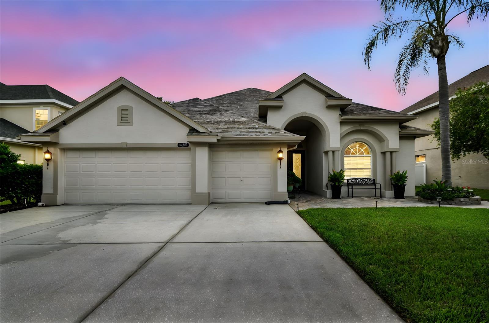 2024 NEW ROOF · PRIME LAND O’ LAKES LOCATION!
Welcome to this beautifully maintained one-story home in the sought-after Plantation Palms Golf Course community. With a NEW ROOF (2024), remodeled spa-inspired primary bath, and striking curb appeal, this 4 bed, 3 bath, 3-car garage + office/den is move-in ready with over 2,500 sq ft of thoughtfully designed living space. Located in FLOOD ZONE X, where flood insurance is typically optional rather than mandatory. The open floor plan is filled with natural daylight, showcasing a bright kitchen with island, snack bar, oversized pantry, and inviting eat-in area. Multiple sliding glass doors extend the living space outdoors to a generous backyard highlighted by a mature fruit-bearing AVOCADO TREE. The private primary suite offers two walk-in closets and a spa-style bath with dual vanities and an upgraded glass shower. Secondary bedrooms are enhanced by a flexible bonus space, while the OVERSIZED laundry room provides built-ins and a utility sink.
The Plantation Palms community adds incredible value with a LOW HOA, NO CDDs, and its own GOLF COURSE offering memberships for every budget, a pro shop, banquet hall, and the popular Mulligan’s Restaurant & Bar. This PRIME LOCATION puts you minutes from shopping, dining, retail, grocery stores, recreation, and just ~30 minutes to Tampa International Airport. Homes like this are rare, schedule your showing TODAY!
Buyer to verify all information, including measurements, HOA fees, CDD status, flood zone designation, school zones, and feature list.