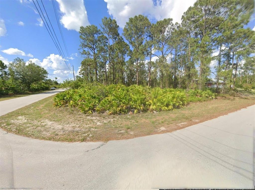 Photo of 577 Beach Avenue S, Lehigh Acres, FL 33974 (MLS # TB8479695)