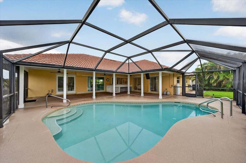 Photo of 100 Matisse Circle W, Nokomis, FL 34275 (MLS # TB8537024)