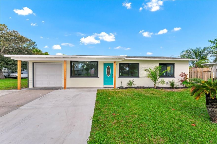 Welcome to this stunningly updated residence offering over 1,150 sq. ft. of beautifully designed living space with an attached garage. Perfectly situated in the heart of Ormond-by-the-Sea—just a short stroll from the beach, shopping, and dining—this home blends modern sophistication with relaxed coastal elegance. Step inside to discover an open and airy floor plan filled with natural light and high-end finishes throughout. The remodeled kitchen is a true showpiece, featuring gleaming quartz countertops,  stainless steel appliances with accent tiling.  Every detail has been thoughtfully selected to combine functionality with refined style. Beautiful luxury vinyl flooring flows throughout the entire home, creating a seamless connection between spaces. The primary suite offers a peaceful retreat, while the guest rooms are bright, spacious, and inviting. The updated guest bath features elegant finishes and modern fixtures, showcasing the home’s cohesive design and attention to detail. The 3rd room provides a flexible third bedroom or den—perfect for guests, a home office, or a private sanctuary. 
The home’s design encourages effortless indoor-outdoor living. Offering the perfect balance of relaxation and entertainment potential. A new deck creates an ideal spot for enjoying morning coffee, evening cocktails, or hosting intimate gatherings. The front yard, provides a welcoming entry framed by tropical plantings. This residence has been meticulously cared for and all upgraded with extensive improvements for efficiency and peace of mind, including a new roof (2025), new A/C system (inside, outside and ductwork (2025), upgraded electrical (300amp service) and plumbing, double pane hurricane-rated black windows, an advanced tankless water heater for optimal energy performance. Additional upgrades include fresh exterior paint, new wood soffits, and stained fencing and deck, as well as updated exterior lighting, GFCI outlets throughout the home and a new utility sink in the garage which will keep yard activity clean-ups outside the house. Located in one of Ormond-by-the-Sea’s most desirable and peaceful neighborhoods, this property offers the perfect combination of coastal serenity and convenience. Enjoy daily walks to the ocean, local cafés, and boutique shops just moments from home.
Every inch of this property reflects pride of ownership, thoughtful design, and refined craftsmanship. With its perfect balance of modern comfort and timeless beachside character, this home offers an exceptional opportunity to experience the best of the Florida coastal lifestyle.
Don’t miss the chance to make this luxury Ormond-by-the-Sea retreat your new seaside sanctuary.