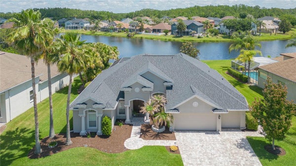 26731 WINGED ELM DR, WESLEY CHAPEL, FL 33544 - Image 04770dce7dd3b4ea80ce2a7aee538c27/3098447192