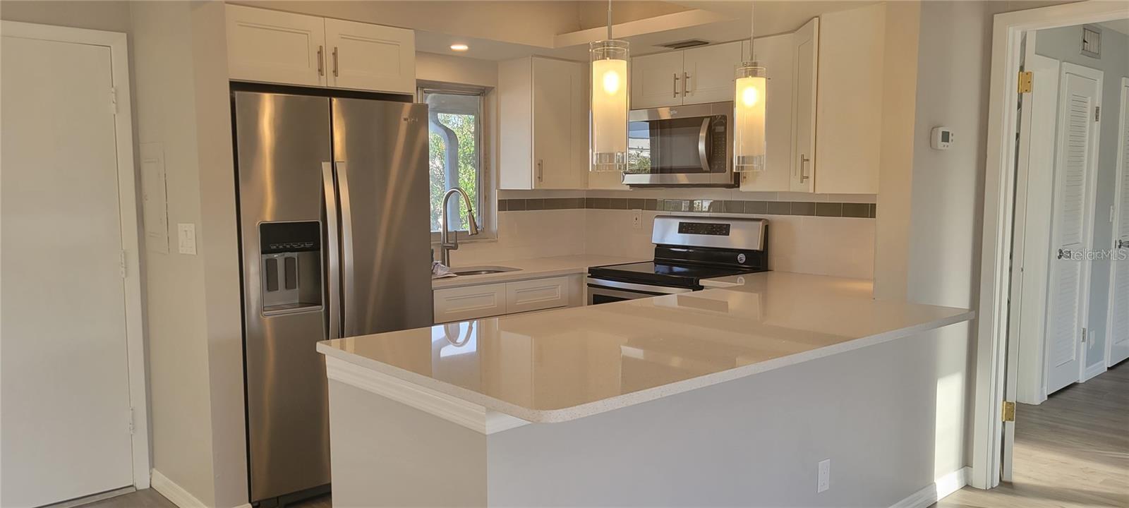 Look at this! Sought after Southgate! Fully and freshly complete quality remodel. New kitchen, bathrooms, flooring, doors, fixtures, lighting, and paint. This condo is immaculate. Amazing Location, just across the street from the Siesta Mall with shopping, restaurants and fitness center. This unit couldn't be any more convenient! Walk to the Post Office. Very private location. Quiet top floor unit. No Pets. 55+ Huge 30' screened in balcony!