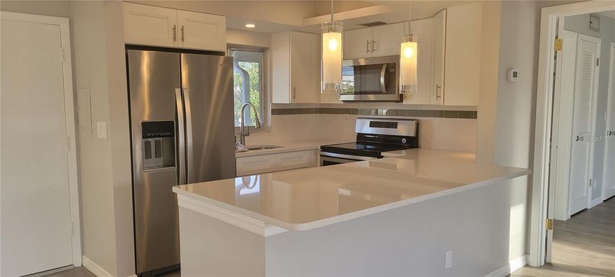 Look at this! Sought after Southgate! Fully and freshly complete quality remodel. New kitchen, bathrooms, flooring, doors, fixtures, lighting, and paint. This condo is immaculate. Amazing Location, just across the street from the Siesta Mall with shopping, restaurants and fitness center. This unit couldn't be any more convenient! Walk to the Post Office. Very private location. Quiet top floor unit. No Pets. 55+ Huge 30' screened in balcony!