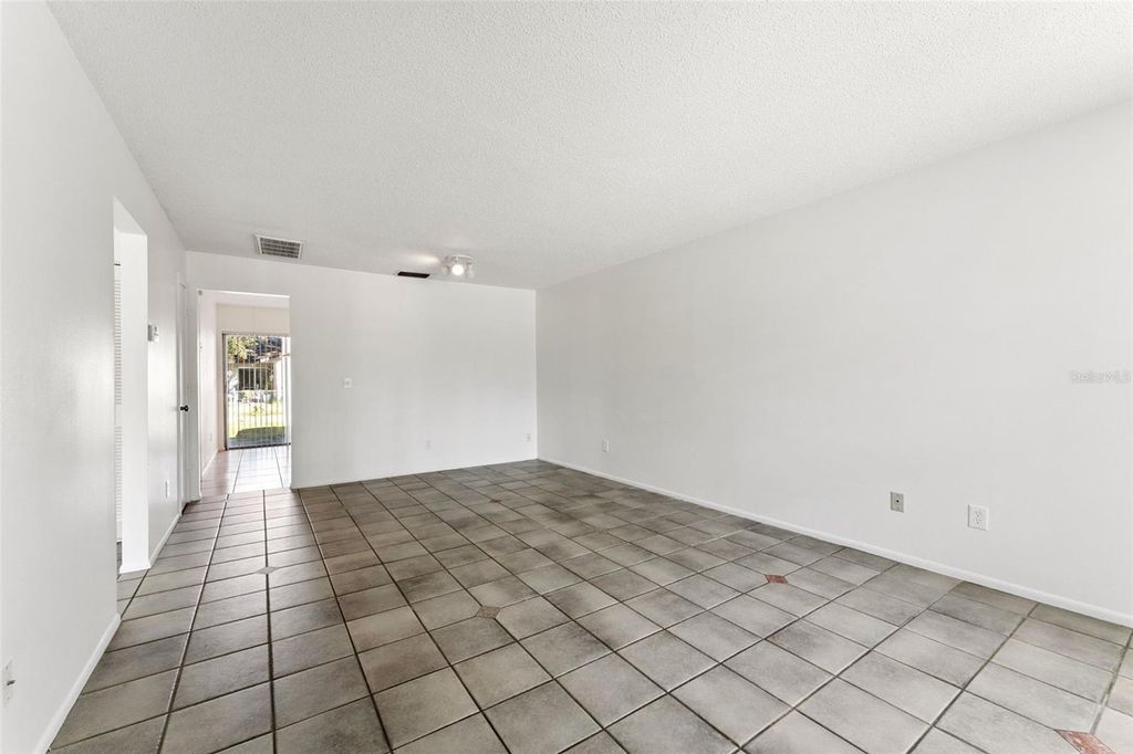 Photo of 8137 Parrot Drive, Orlando, FL 32825 (MLS # O6367644)