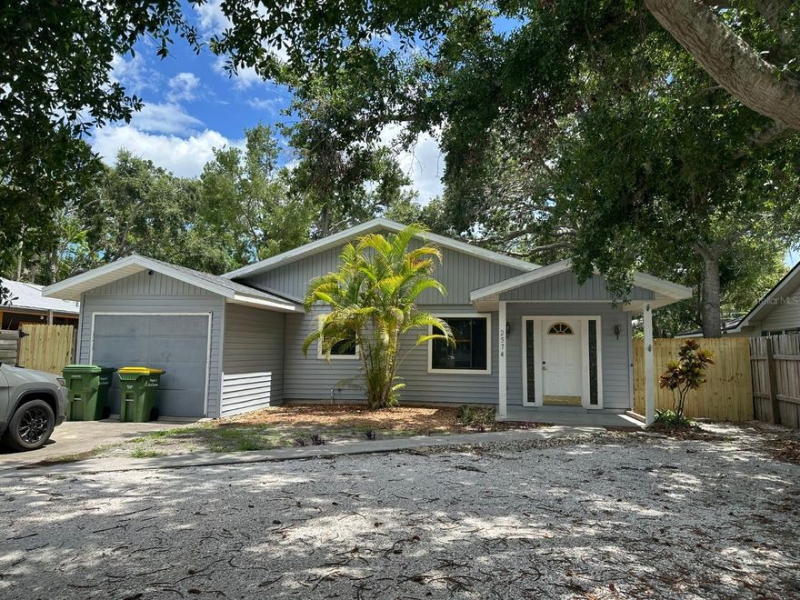 Welcome to Arlington Park, one of Sarasota’s most desirable and rapidly growing neighborhoods. Located on a quiet dead-end street directly across from Arlington Park, this property is just steps away from playgrounds, workout stations, basketball and tennis courts, public pools, and beautiful walking trails surrounded by nature and wildlife. This property offers incredible flexibility and potential depending on your goals. It can be renovated into a beautiful primary residence, used as a profitable rental property, transformed through a full fix-and-flip renovation, or even torn down to build your dream home on this ideally located lot in an area surrounded by new construction homes. Currently generating $3,000 month in rental income, the property is rented as a main house for $2,000/month plus an attached efficiency for $1,000/month with a separate private entrance. Tenants may remain for investors seeking immediate income, or the property can be delivered vacant with a 30-day notice to tenants. The home features a flexible layout, pool access, a new roof, and a prime central Sarasota location just minutes from Downtown Sarasota, Sarasota Memorial Hospital, Siesta Key Beach, and Lido Beach. Rare opportunity in one of Sarasota’s most sought-after neighborhoods. Schedule your private showing today.