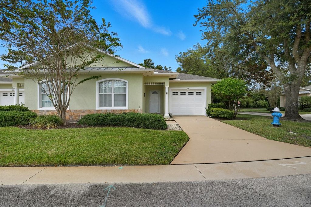 Photo of 35 Veranda Way #29, Palm Coast, FL 32137 (MLS # FC313283)