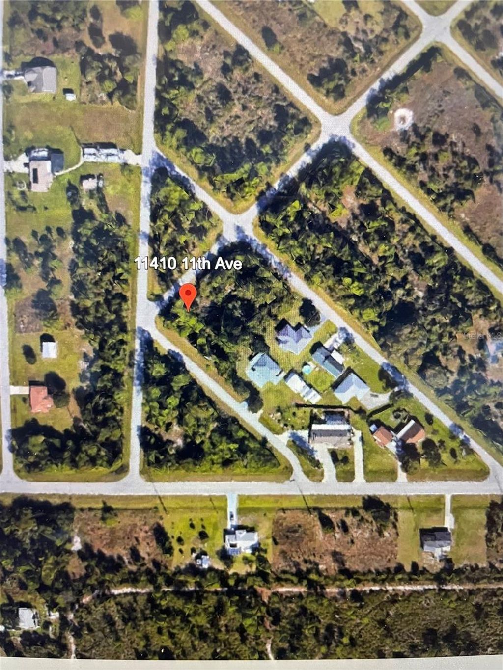 Photo of 11410 11th Avenue, Punta Gorda, FL 33955 (MLS # A4665582)