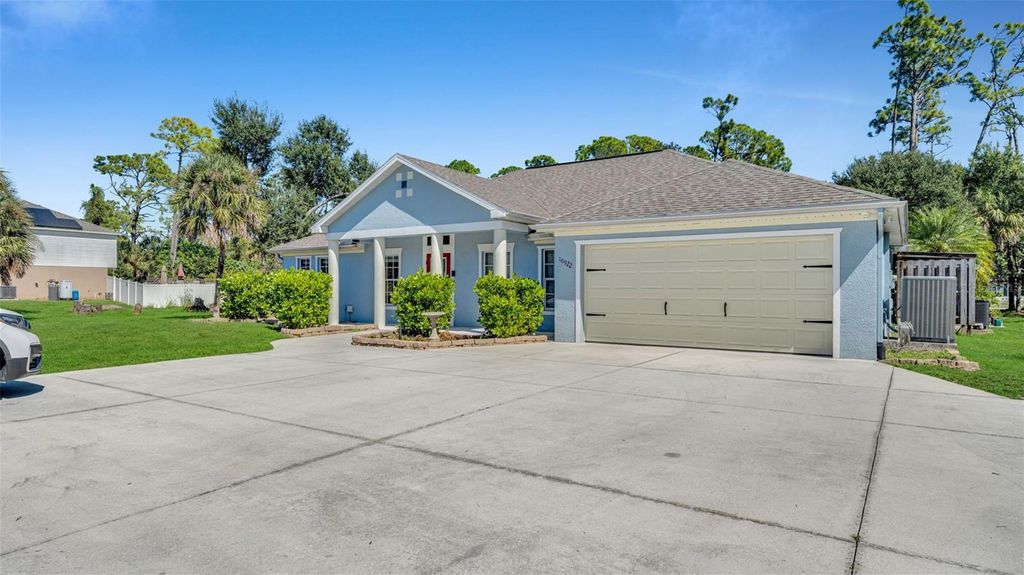 Photo of 16922 Toledo Blade Boulevard, Port Charlotte, FL 33954 (MLS # TB8435731)