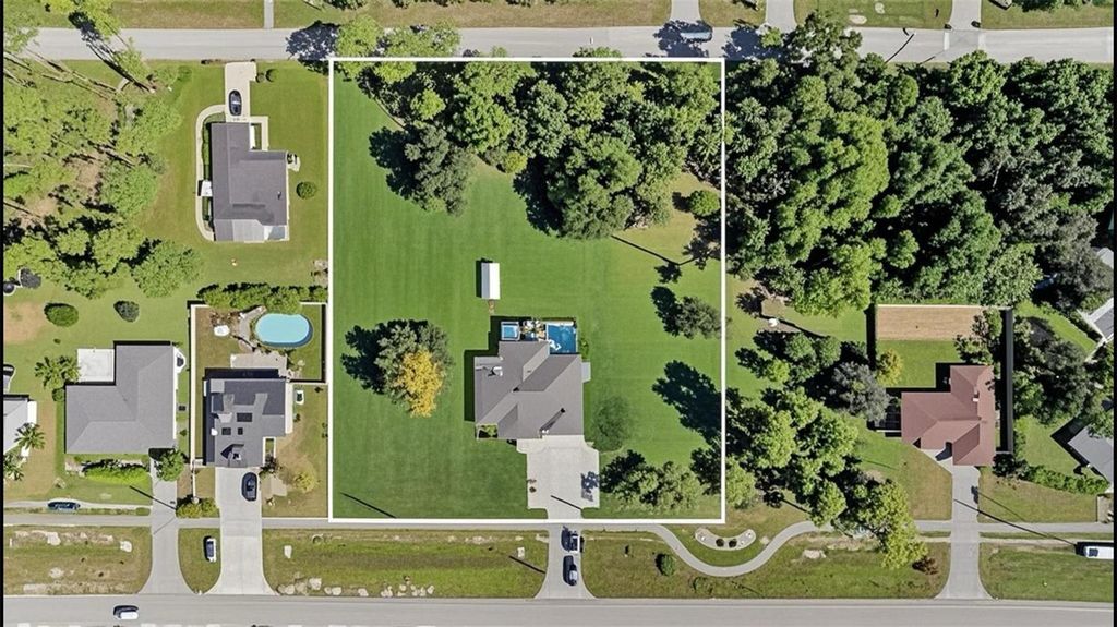 Photo of 16922 Toledo Blade Boulevard, Port Charlotte, FL 33954 (MLS # TB8435731)