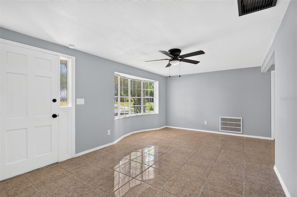 Photo of 4125 Oakfield Avenue, Holiday, FL 34691 (MLS # TB8546789)