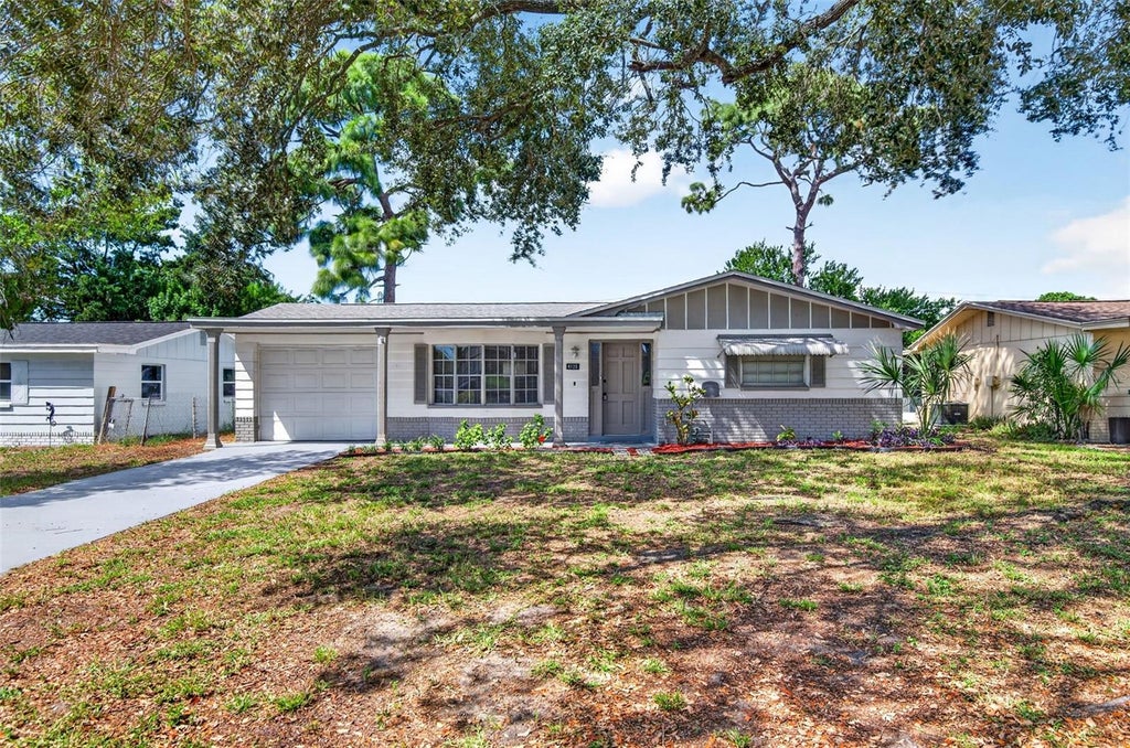 Photo of 4125 Oakfield Avenue, Holiday, FL 34691 (MLS # TB8546789)
