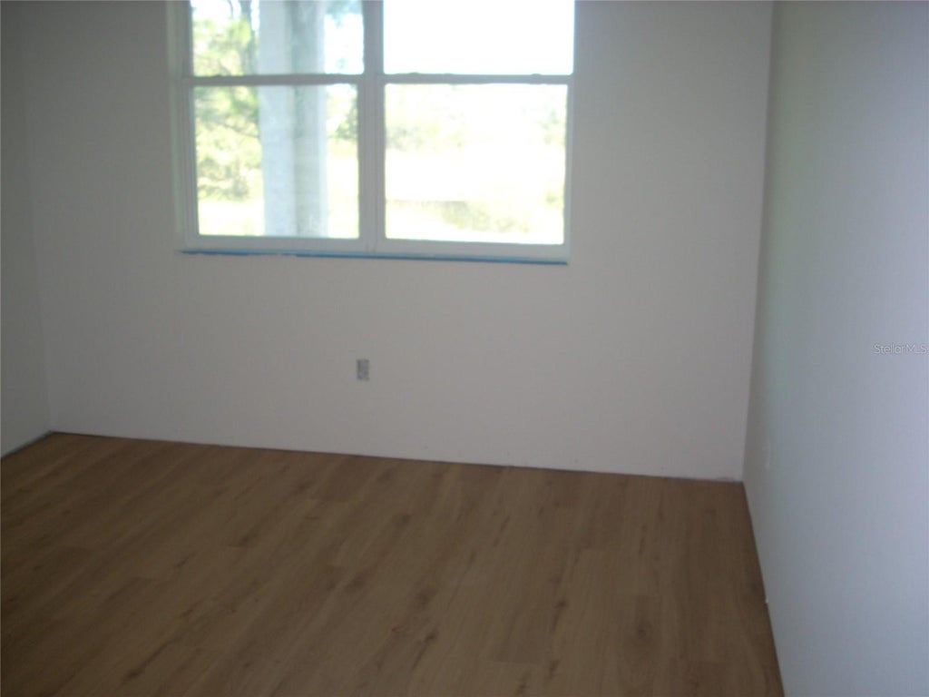 Photo of 9139 Trevino Dr, Weeki Wachee, FL 34613 (MLS # TB8557176)