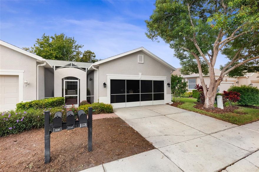 WELCOME HOME,, This beautiful End Unit on PRIVATE CONSERVATION with 2bed rooms 2 bath and 2 car garage with new screen on garage door, along with New screened Courtyard entry.  Beautiful Brushed Oak Engineered wood floors through out. Kitchen has Reverse osmosis filter.  Kitchen appliances new in 2020, Range has convection oven with a built in air fryer (used only one time) all appliances are stainless. New Garbage Disposal installed 2 weeks ago. Recent Improvements *Roof (2021) *A/C (2023) Water Softener (2025) Fresh interior paint.  * New solar panel  with attic fan for extra insulation just installed. Dinning room has tray ceiling and beautiful chandelier.  Upgraded Fans and Light fixtures in all rooms.  Master bedroom suite is tucked away at the rear of  home with with an en-suite bath, huge walk-in closet, walk in shower and double sinks.  2nd  bedroom over looks private screened courtyard.  Laundry room is across from 2nd bedroom with washer and dryer and cabinets. Large  Lanai overlooking Private Conservation area  and beautiful  flooring. THIS IS A MUST SEE HOME. The Groves is an active-adult Gated Golf Course community with Club House , Restaurant, library, fitness center, ballroom, 18-hole golf course with driving range and Pro-shop, plus tennis courts, pickleball, bocce, shuffleboard and heated Pool and Spa..  Right outside the gates is a Publix Shopping center and so much more.  Come and see this home today. "MRS.  CLEAN LIVES HERE