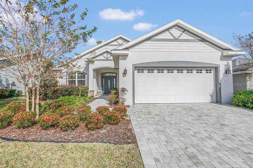 DO NOT MISS THIS STUNNING 4/2/2 HOME IN DENSON PARK! 
Experience effortless Florida living in a beautifully maintained property featuring luxury vinyl flooring throughout, a chef-ready kitchen with stainless steel appliances, quartz countertops, an eat-in island, gas range, and tankless water heater.
Enjoy peaceful mornings and golden-hour views with a tree-lined grassy field behind the home—no rear neighbors, just privacy and calm.
Curb appeal? Nailed it. The home showcases pavered entry and driveway, plus stone accents that elevate the entire front elevation.
Located less than a quarter mile from The Villages, this community is golf-cart friendly and just minutes from shopping, dining, and Lake Sumter Landing.