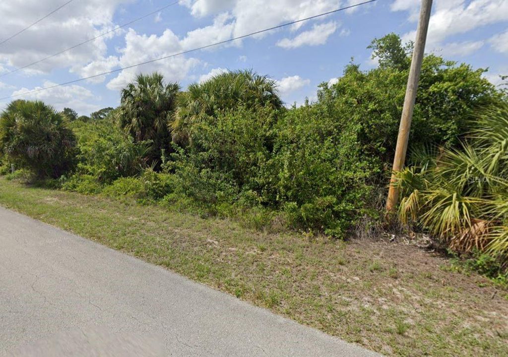 Photo of 747 Long Distance Lane, Lehigh Acres, FL 33974 (MLS # C7517061)
