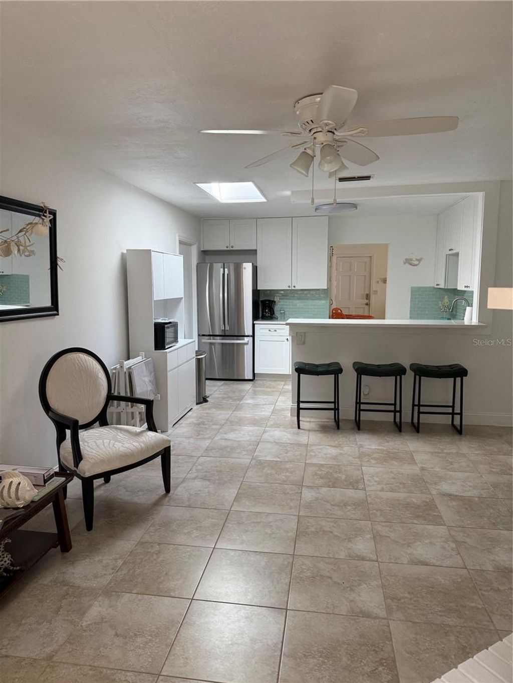 Photo of 3601 Saxon Drive, New Smyrna Beach, FL 32169 (MLS # O6381428)