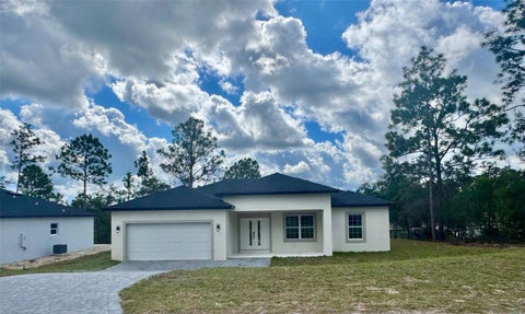 Photo of 1864 W Linden Drive, Citrus Springs, FL 34434 (MLS # O6453714)