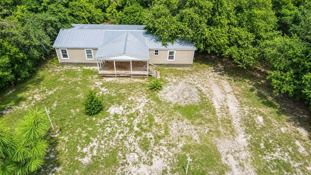 Photo of 42135 Pine Valley Drive, Paisley, FL 32767 (MLS # O6435038)