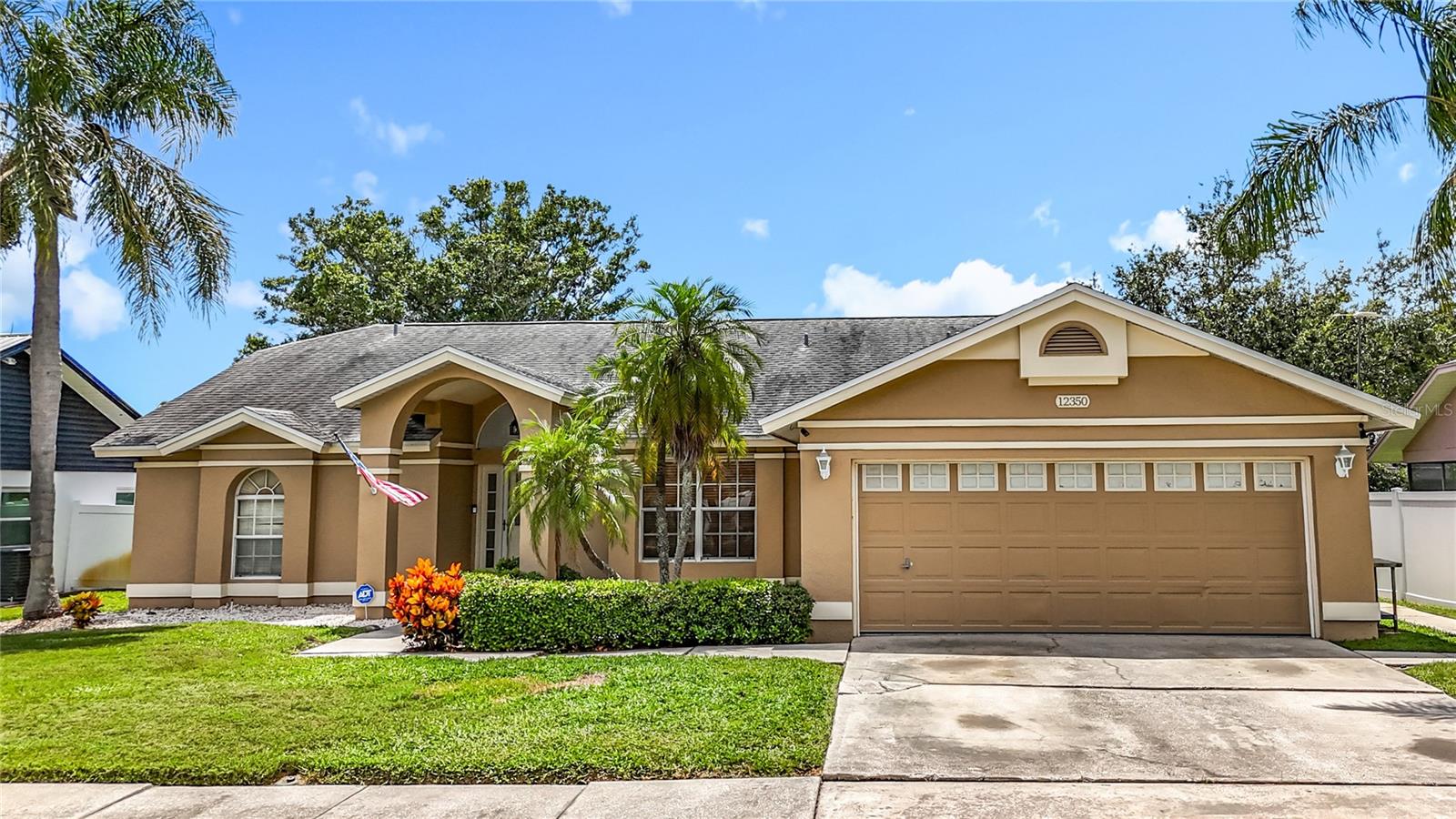 Under contract-accepting backup offers. Don’t miss this fantastic opportunity in the highly desirable Shadow Pines neighborhood! This spacious 3-bedroom, 2-bath home is located in a NON-flood zone and offers a host of recent upgrades, making it move-in ready for its next owner. Enjoy peace of mind with a 10-year-old roof, a new A/C system (2022) with a transferable warranty, a gas water heater (2023), fresh exterior paint (2024), and more. The two-car garage doubles as a mancave with custom epoxy flooring and ample built-in storage. Inside, the home features vaulted ceilings, a bright, open floor plan, and a split-bedroom layout for added privacy. The Great Room flows beautifully onto a pavered back patio, surrounded by a fenced backyard with newer vinyl fencing—perfect for outdoor entertaining. There's even a dedicated 220V outlet ready for a hot tub and a personal shed for additional storage. Additional highlights include: Transfer switch for automatic generator hookup, Plywood window coverings for storm protection, Mounted antenna providing access to ~90 channels, Pre-wired already for surveillance cameras, and hard wired alarm system, Natural gas connection, Attic space for storage, and Irrigation system. This well-maintained home is ideally located just minutes from top-rated schools, shopping, dining, and only 15 minutes to award-winning Gulf beaches. With quick access to Tampa, St. Petersburg, and two international airports, this property offers the perfect balance of comfort, convenience, and value. Bring your personal touches and enjoy instant equity in this exceptional home!