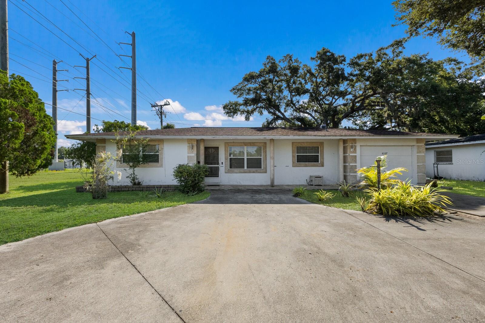 One or more photo(s) has been virtually staged. Welcome to this inviting 2-bedroom, 2-bathroom home nestled in the sought-after Kensington Park neighborhood of Sarasota. Located just minutes from shopping, dining, schools, I-75 highway, and world-famous Gulf beaches, this property offers the perfect blend of convenience and tranquility. Set on a generously sized lot with beautiful, and mature landscaping. This home boasts plenty of parking and even features a fruit-bearing lemon tree in the front yard—perfect for enjoying fresh lemonade all year round! Inside, you’ll find a spacious layout with great bones and tons of potential. While the home could use a little TLC to make it your own. This house offers plenty of windows to help fill the space with warm sunlight. Whether you're looking for your first home or a great investment opportunity, this Kensington Park gem is full of charm and ready for its next chapter. Don't miss out!